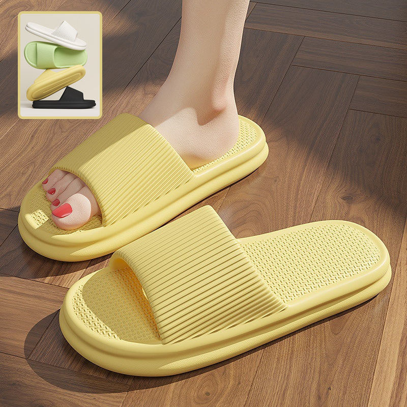Yellow striped slip-on home slippers with textured sole and open toe