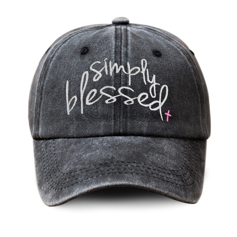 Dark gray washed baseball cap with embroidered "Simply Blessed" script, stitched brim