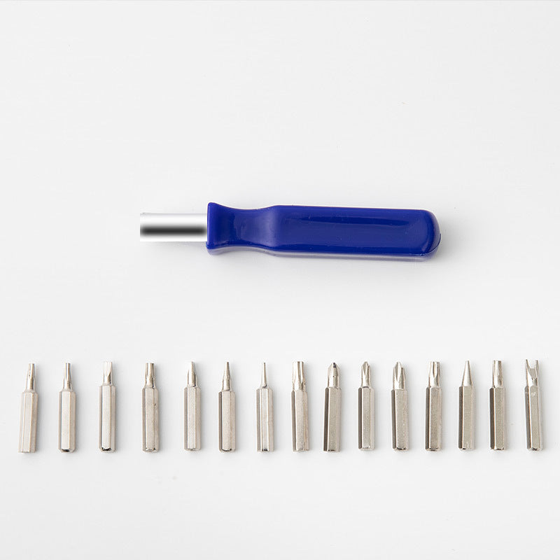 Single blue-handled screwdriver with metal bits laid out