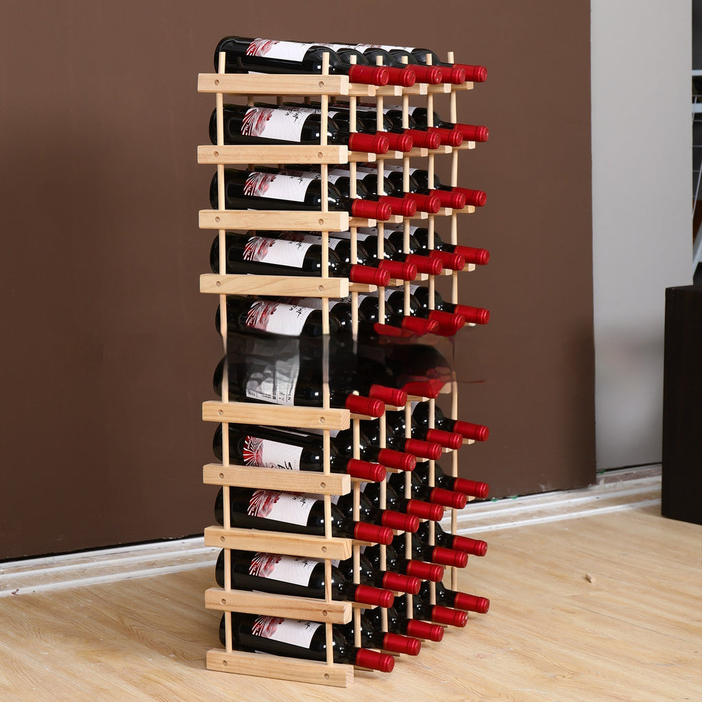Wood wine rack with multiple bottle slots holding red wine bottles