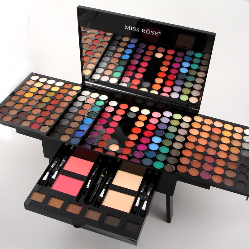Piano-shaped eyeshadow palette set with mirror, multi-color pans, blush blocks