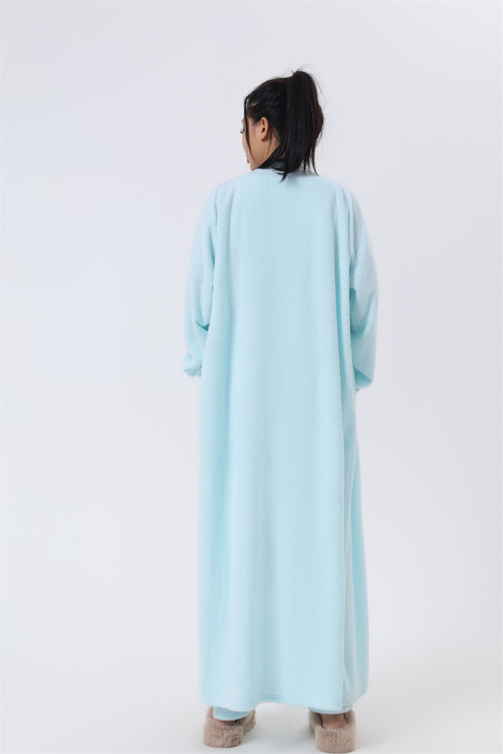Women’s 3-piece pajama set in light blue, back view: long cardigan robe and pants.