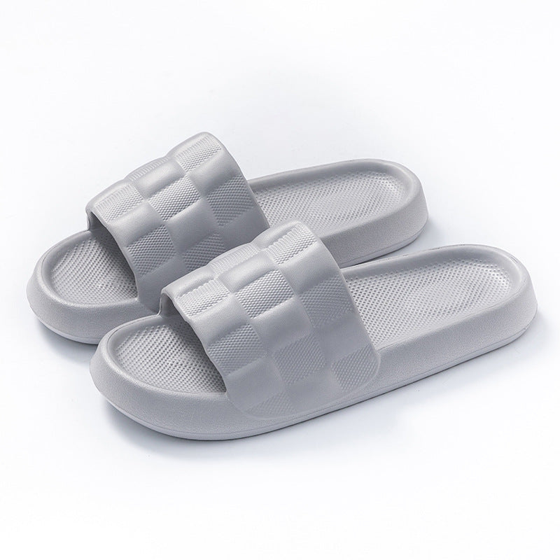Women's EVA slide sandals in light gray with checkered straps and textured footbed